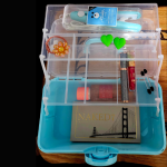 Includes Naked Makeup Palette consisting of 12 shades and a double sided brush, random color 250ml glitter Body spray, Random color beautiful heart earrings, x2 eyeshadow applicators, x1 lip gloss, x1 Mascara, x1 pretty hair tie and x1 Mini Hair Straightener and the Vibrant colored Multifunctional Storage box.